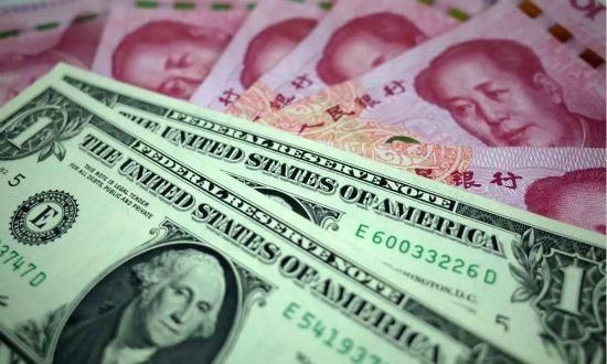 1万美元可以换中国人民币多少钱？美元如何计算成人民币